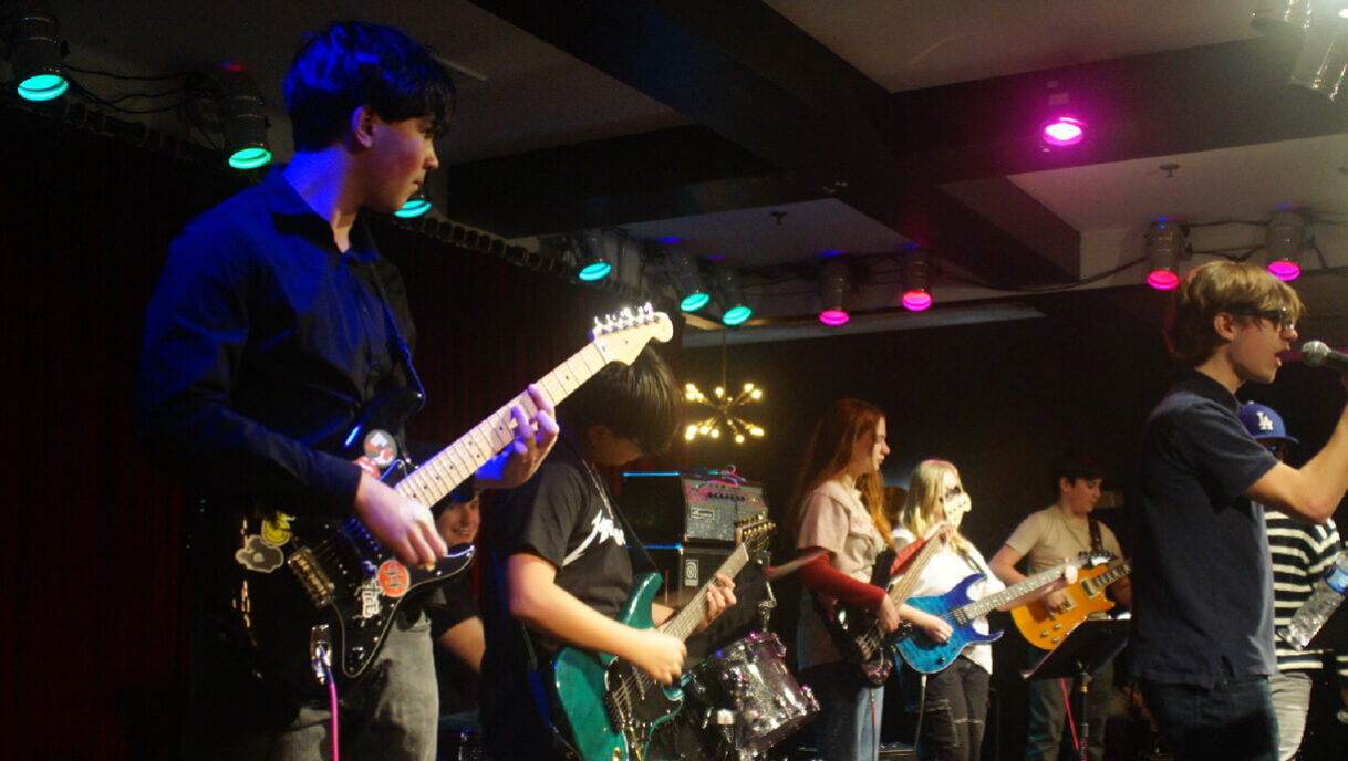 Kids playing live music